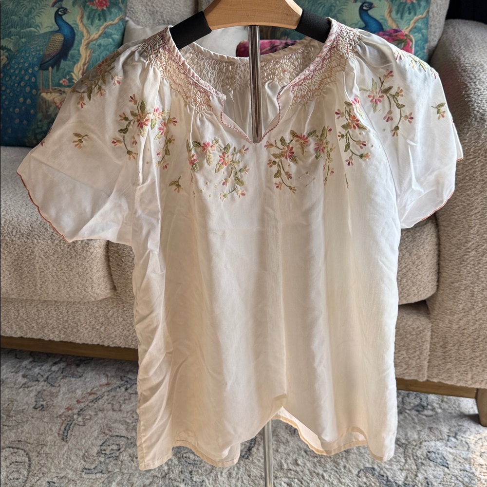 Embroidered light fabric top